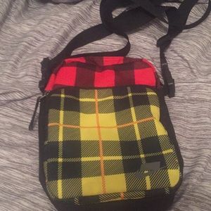 Red and Yellow Nike Man Bag